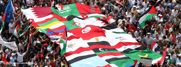 Egyptian crowd holding Arab flags